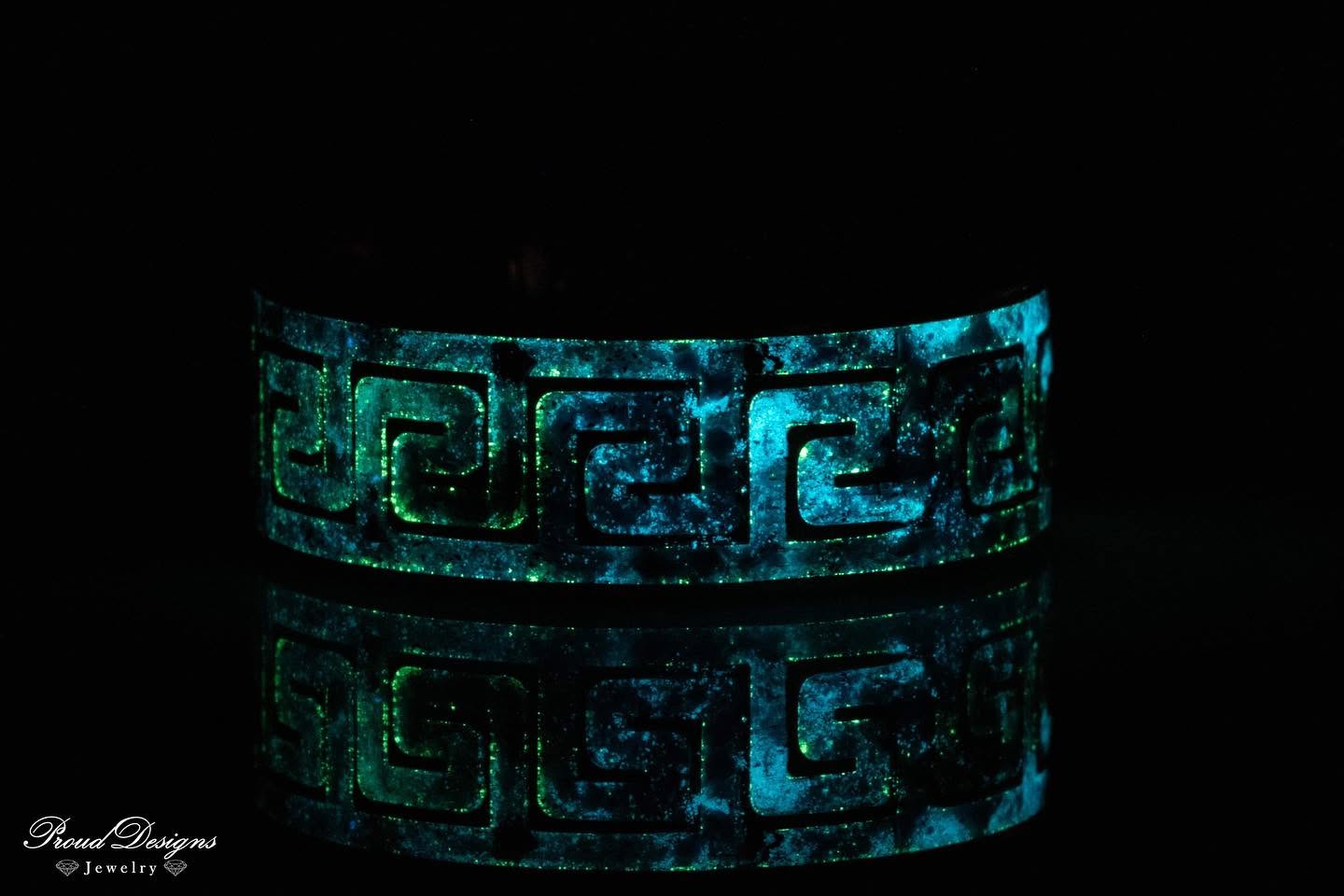 Ring with a glowing galaxy inlay, handmade by Proud Designs Jewelry